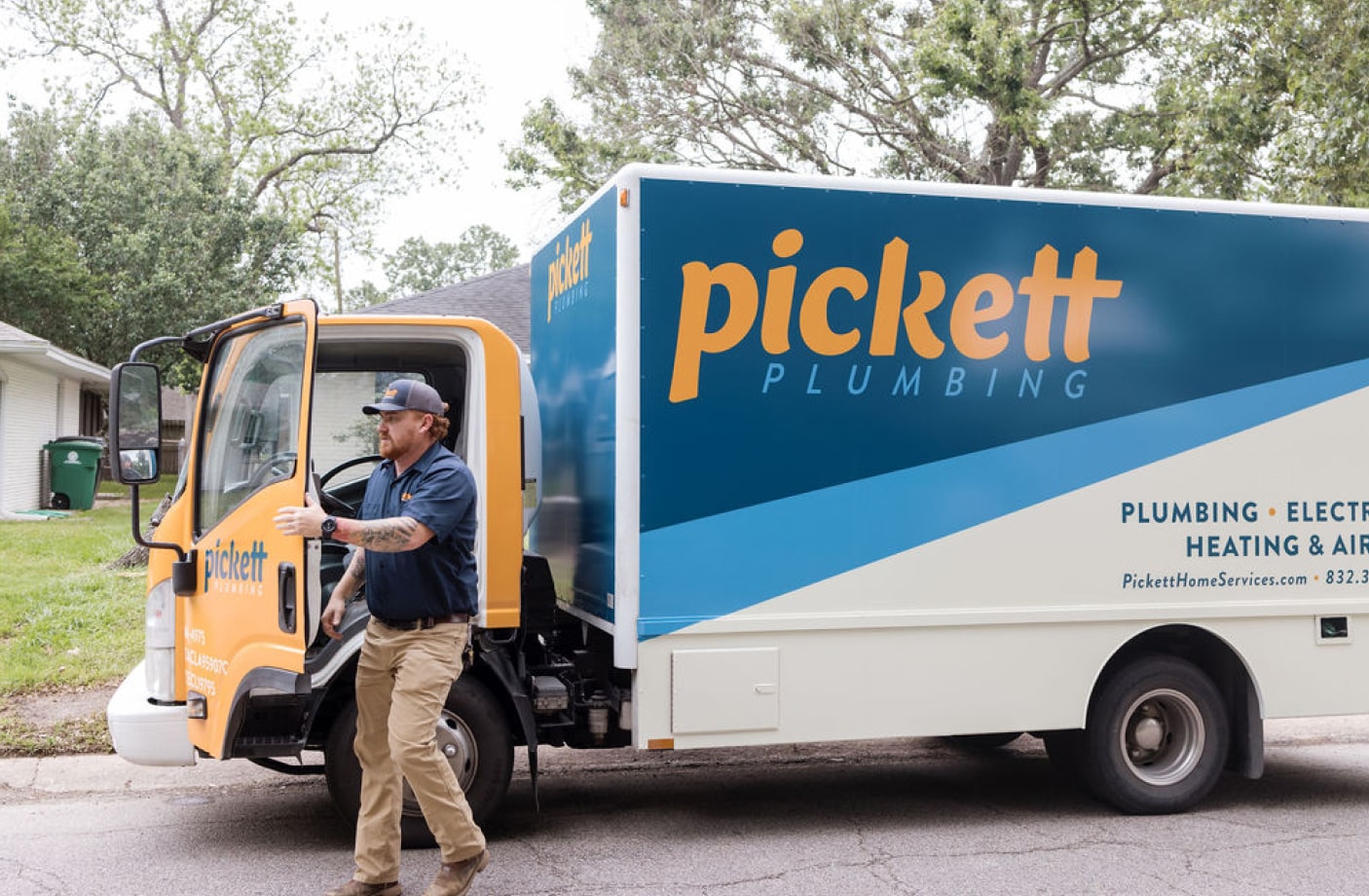 Technician next to Pickett truck in Houston, Texas.